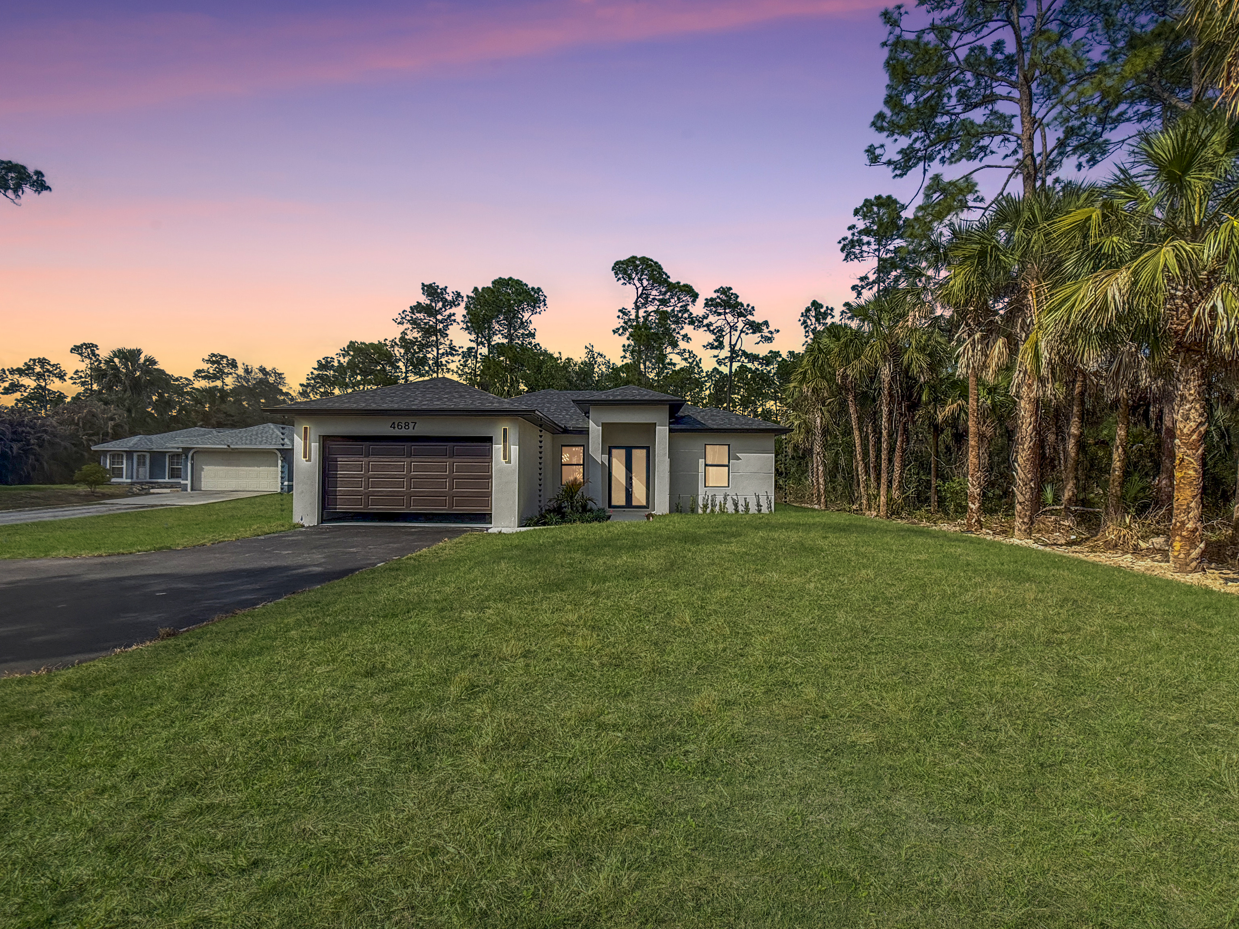 Twilight Exterior — 4687 14th Ave SE Naples